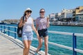 Summer family vacation, mother and daughter teenager walking together eating ice cream Royalty Free Stock Photo