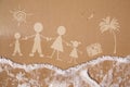 Summer family vacations, on wet sand texture Royalty Free Stock Photo