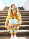 Summer and fashion concept - portrait pretty fun blonde girl in Royalty Free Stock Photo