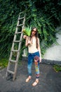 Summer fashion young woman with sunglasses hippie style jeans an Royalty Free Stock Photo