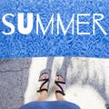 Summer. Female feet in sandals near the pool Royalty Free Stock Photo