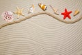 Summer flat composition with seashells, rope, sand beach and space for text on sandy background Royalty Free Stock Photo