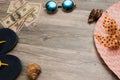 Summer flat lay of beach set items - sea, stones, necklace and panama hat, on background. holiday and travel image