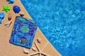 Summer flat lay, blue themed items by the poolside, Royalty Free Stock Photo