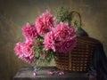 Summer floral still life with beautiful bouquet dahlias in a basket