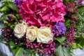 Summer flower bouquet with white roses, pink hydrangea, bluebells, baby's breath