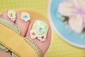 Summer flower pedicure. Royalty Free Stock Photo