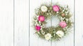 Summer flower wreath on white wooden background Royalty Free Stock Photo