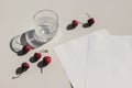 Summer food still life composition. Fresh red cherries fruit on beige table background. Stationery mock up scene. Blank