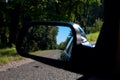 Summer forest road in the rear view Royalty Free Stock Photo