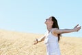 Summer freedom woman in field Royalty Free Stock Photo