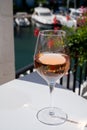 Summer on French Riviera Cote d`Azur, drinking cold rose wine from Cotes de Provence on outdoor terrase in Port Grimaud, Var, Royalty Free Stock Photo