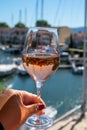 Summer on French Riviera Cote d`Azur, drinking cold rose wine from Cotes de Provence on outdoor terrase in Port Grimaud, Var, Royalty Free Stock Photo