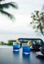 Summer fresh drink butterfly pea drink and slice of lime with empty bowl on table dinner Royalty Free Stock Photo