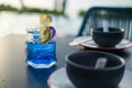 Summer fresh drink butterfly pea drink and slice of lime with empty bowl on table dinner Royalty Free Stock Photo