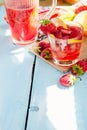 Summer fresh fruit flavored infused water of strawberry, lemon a Royalty Free Stock Photo