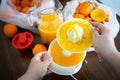 Summer fresh orange fruit getting squeezed Royalty Free Stock Photo