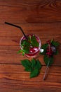 Summer fresh red currant ice tea in glass on dark background. Seasonal vitamins healthy food. Easy homemade recipe photo Royalty Free Stock Photo