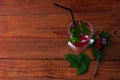 Summer fresh red currant ice tea in glass on dark background. Seasonal vitamins healthy food. Easy homemade recipe photo Royalty Free Stock Photo