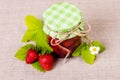 Fresh red strawberry and jam on textile background Royalty Free Stock Photo