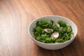 Summer fresh salad with radish, cucumber and herbs in white bowl Royalty Free Stock Photo