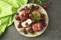 Summer fruit mix - cherry, blueberry, peach. Fruit salad plate. Flat lay with copy space Royalty Free Stock Photo