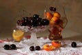 Summer fruit plate with black cherry and apricot, lemon close up Royalty Free Stock Photo