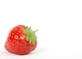 Summer fruit salad ingredients, red strawberry with green stalk Royalty Free Stock Photo