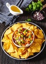 summer fruit salsa with tortilla chips on plate