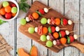 Summer fruit skewers on a wood serving board Royalty Free Stock Photo