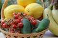 Summer Fruit and Vegetable Harvest - Ginkaku Korean Melons with Pineapple, Bananas, Jalapeno Peppers and Tomatoes Royalty Free Stock Photo