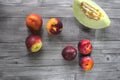 Summer fruits, melon, red plums and nectarine