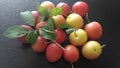 Summer fruits. Organic fresh fruits on a black wooden table.