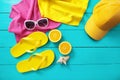 Summer fun time and accessories on blue wooden background. Mock up and copy space Royalty Free Stock Photo