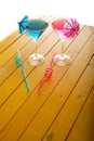 Summer fun vacation. Pink and blue beach party cocktail drinks. Royalty Free Stock Photo