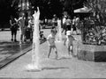 Summer fun in water fountain Royalty Free Stock Photo