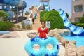 Summer funny rest in the water park. Royalty Free Stock Photo
