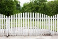 Summer garden in backyard and wooden fence. Wooden Fence Solid Privacy in rustic style. Long country style garden fence in country