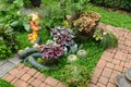 Summer garden landscape with pumpkins, zucchini and different types of herbs