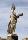 Summer by Giovanni Caccini, one of four ornamental statues of the Seasons on the Holy Trinity Bridge in Florence. Royalty Free Stock Photo