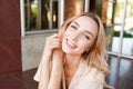 Summer girl portrait. woman smiling happy on sunny day outside city background . young woman outdoors