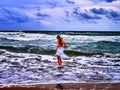 Summer girl sea walk on water beach. Royalty Free Stock Photo