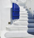 Scenic white stairs and a blue door in Oia, Santorini Royalty Free Stock Photo