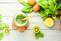 Summer green detox smoothie with spinach, kiwi and citrus
