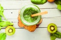 Summer green detox smoothie with spinach, kiwi and citrus