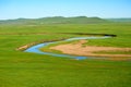 The summer green grassland and river Royalty Free Stock Photo