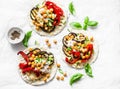 Summer grilled garden vegetables and spicy chickpeas vegetarian tortillas on a light background, top view. Healthy food Royalty Free Stock Photo