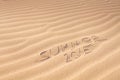 Summer 2015 handwriting on the sand Royalty Free Stock Photo