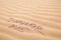 Summer 2015 handwriting on the sand Royalty Free Stock Photo