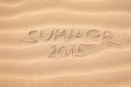 Summer 2015 handwriting on the sand Royalty Free Stock Photo